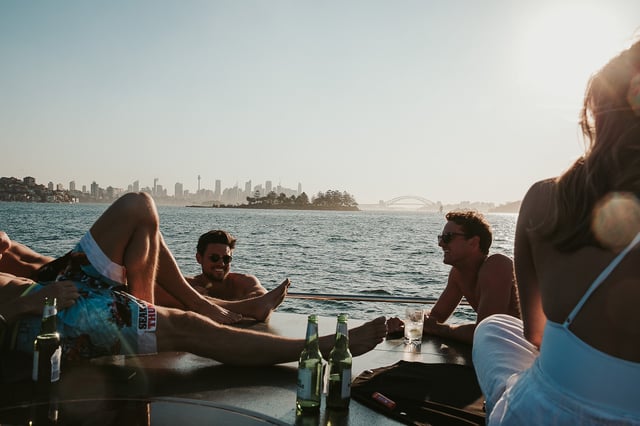 group of people socially drinking on a yacht in Sydney 