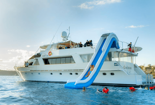 superyacht with floating slide and toys