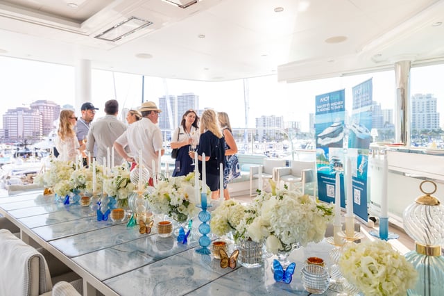 table setting at a corporate event on a yacht