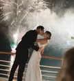 bride and groom infront of fireworks
