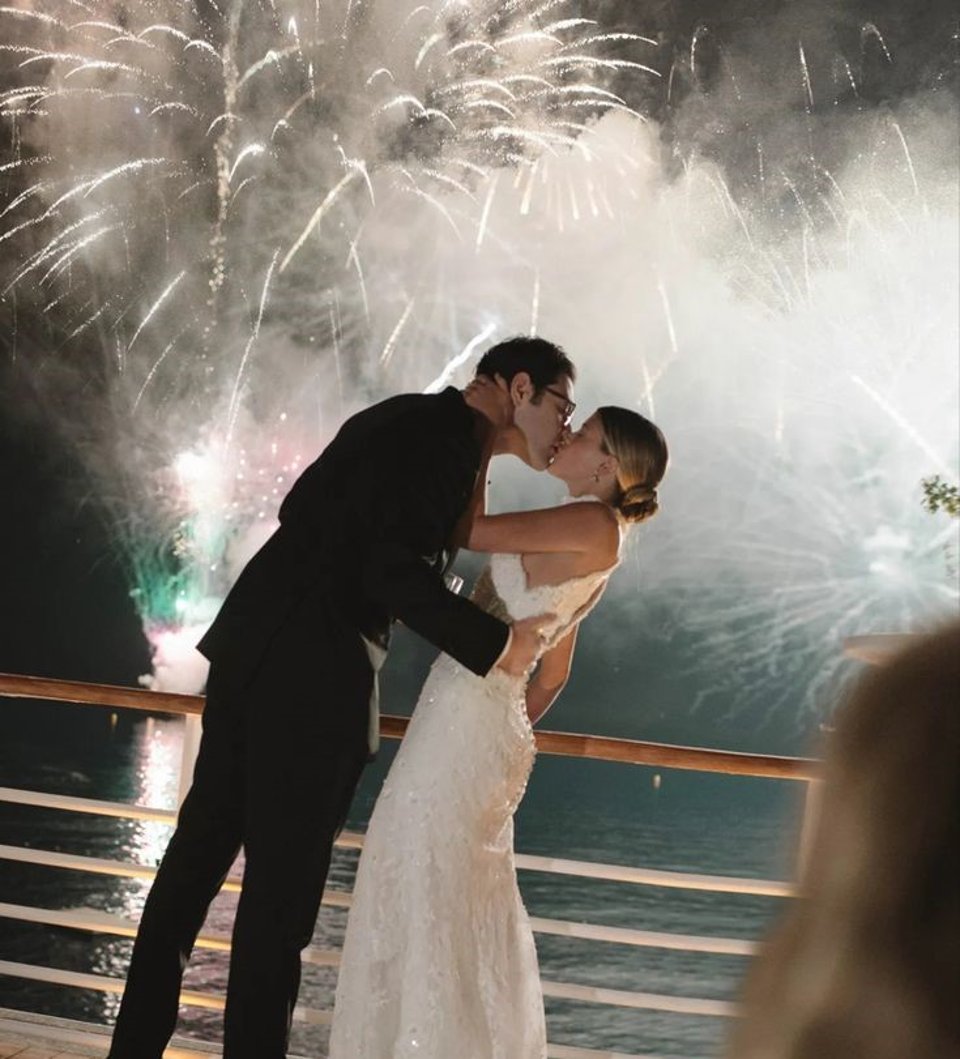bride and groom infront of fireworks