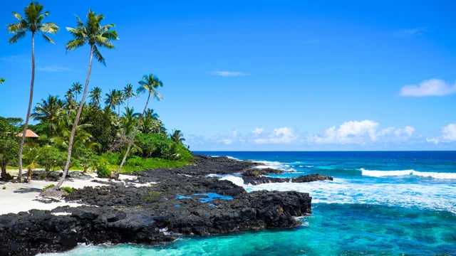 Tropical beach with blue sea and sky at Lefaga, Matautu, Upolu Island, Samoa