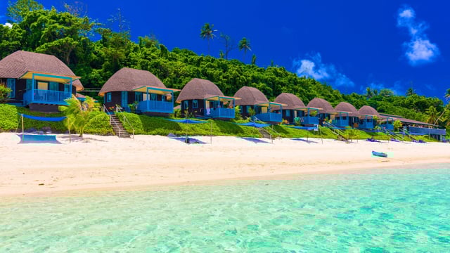 Huts in the coast of Lalomanu