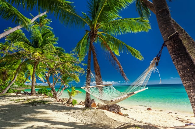 Hammock under the palm trees in Fiji