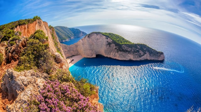 Navagio beach with motorboat on Zakynthos Island, Greece